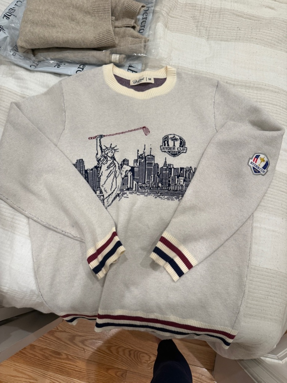 Ryder Cup Beige Crewneck Sweater with NYC Golf Graphic